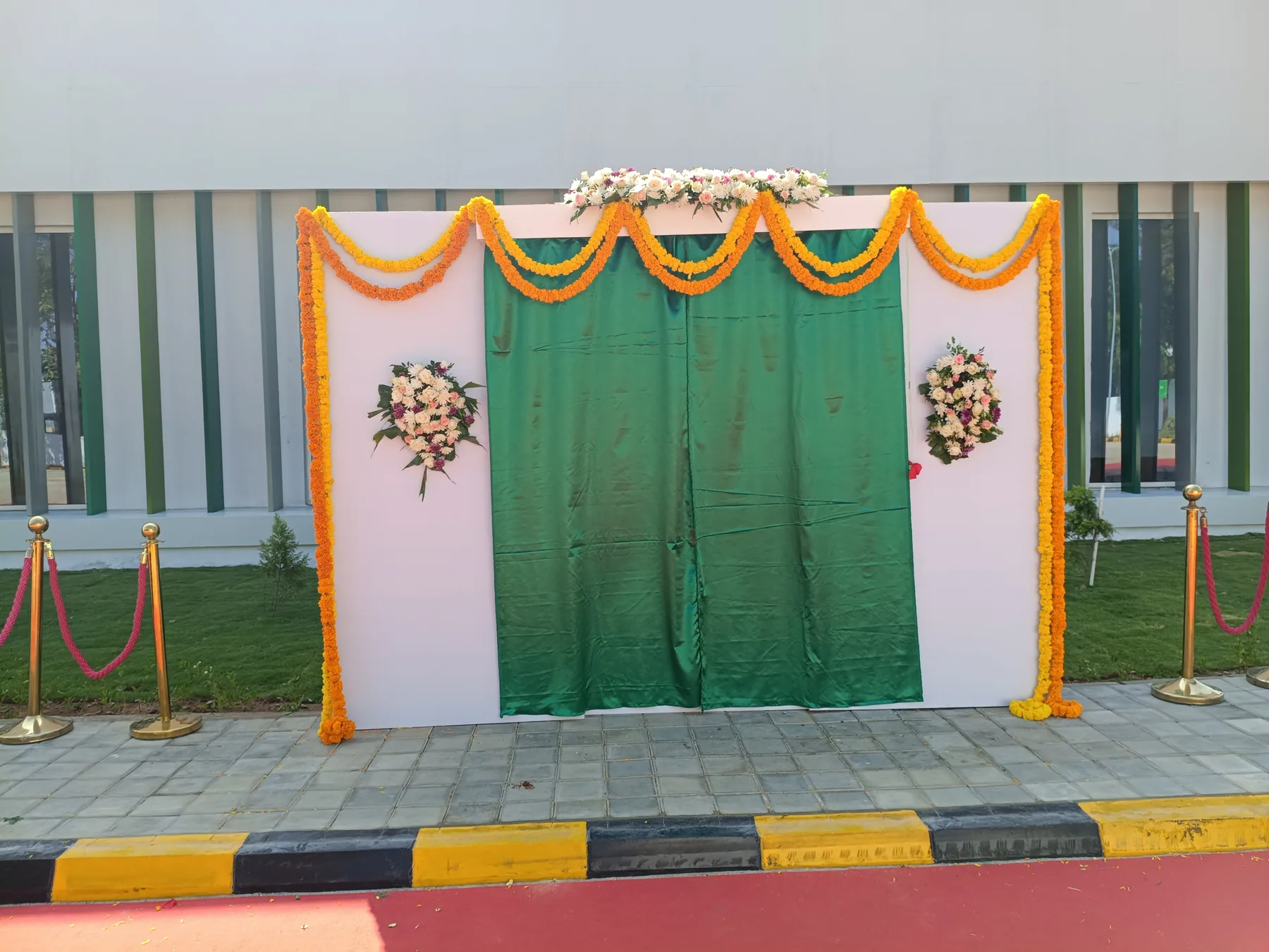 Curtained ceremonial plaque beside the entrance