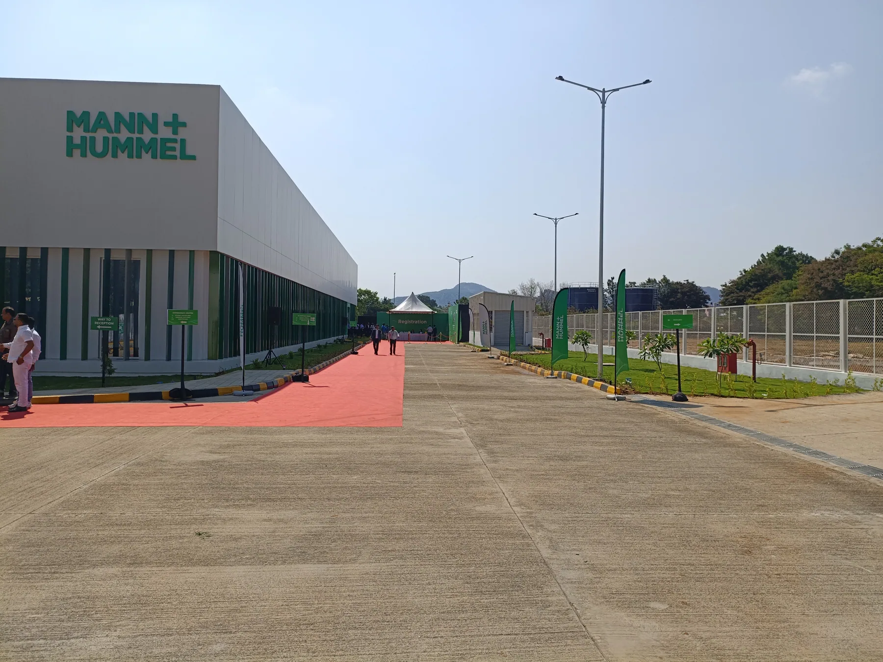 Branded building beside the event approach