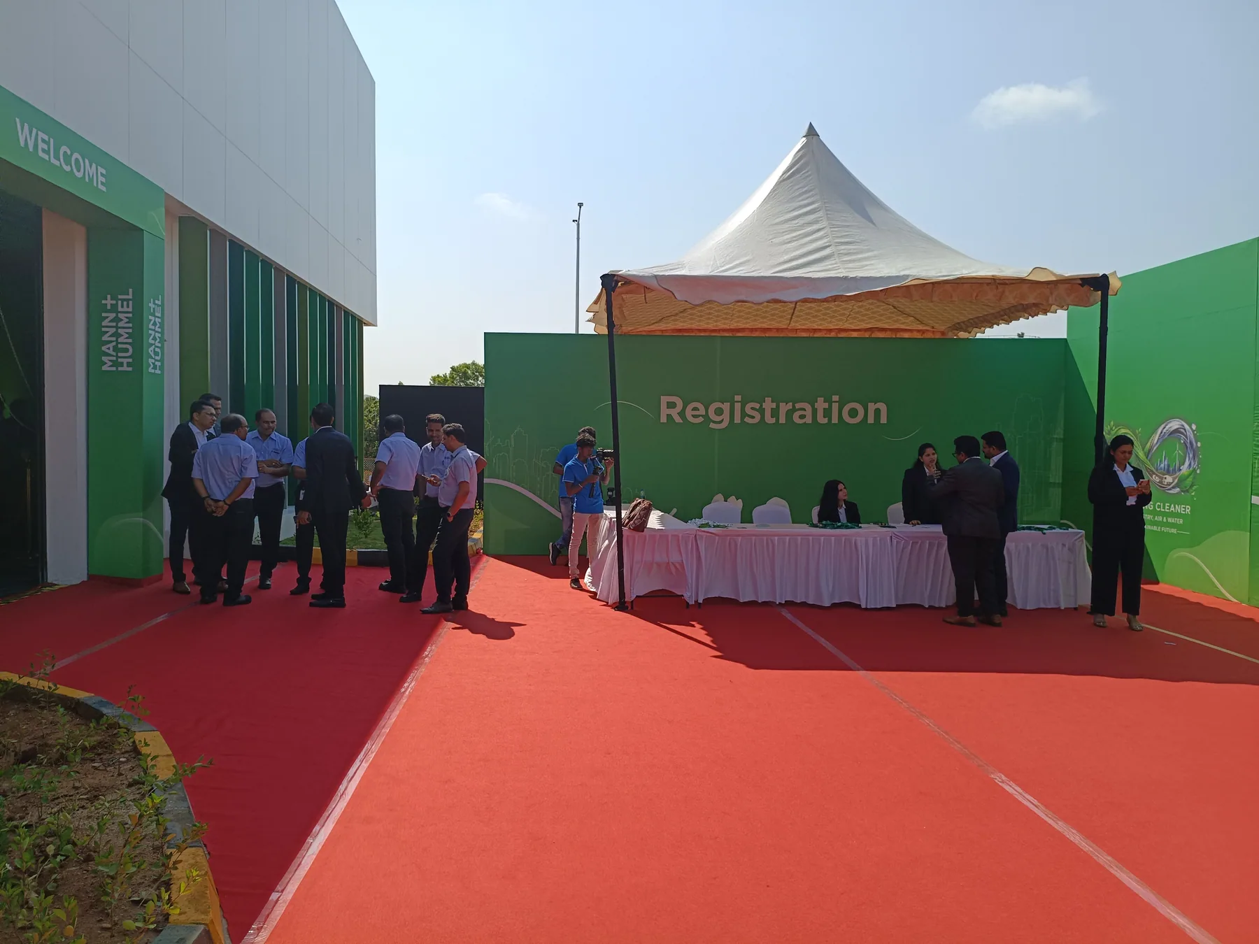 Registration desk beneath a white canopy