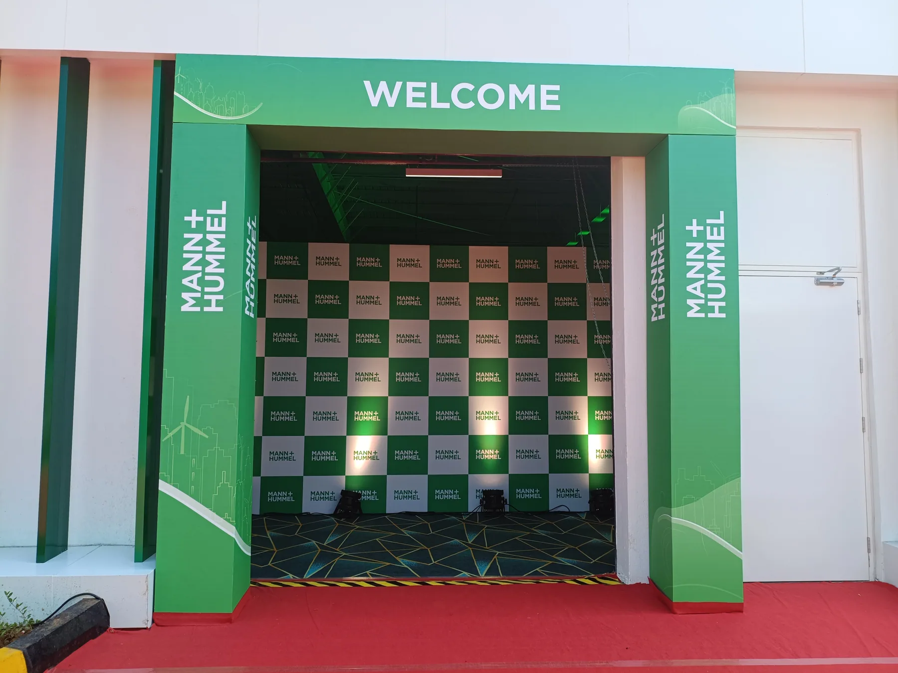 Welcome entrance with a branded photo backdrop