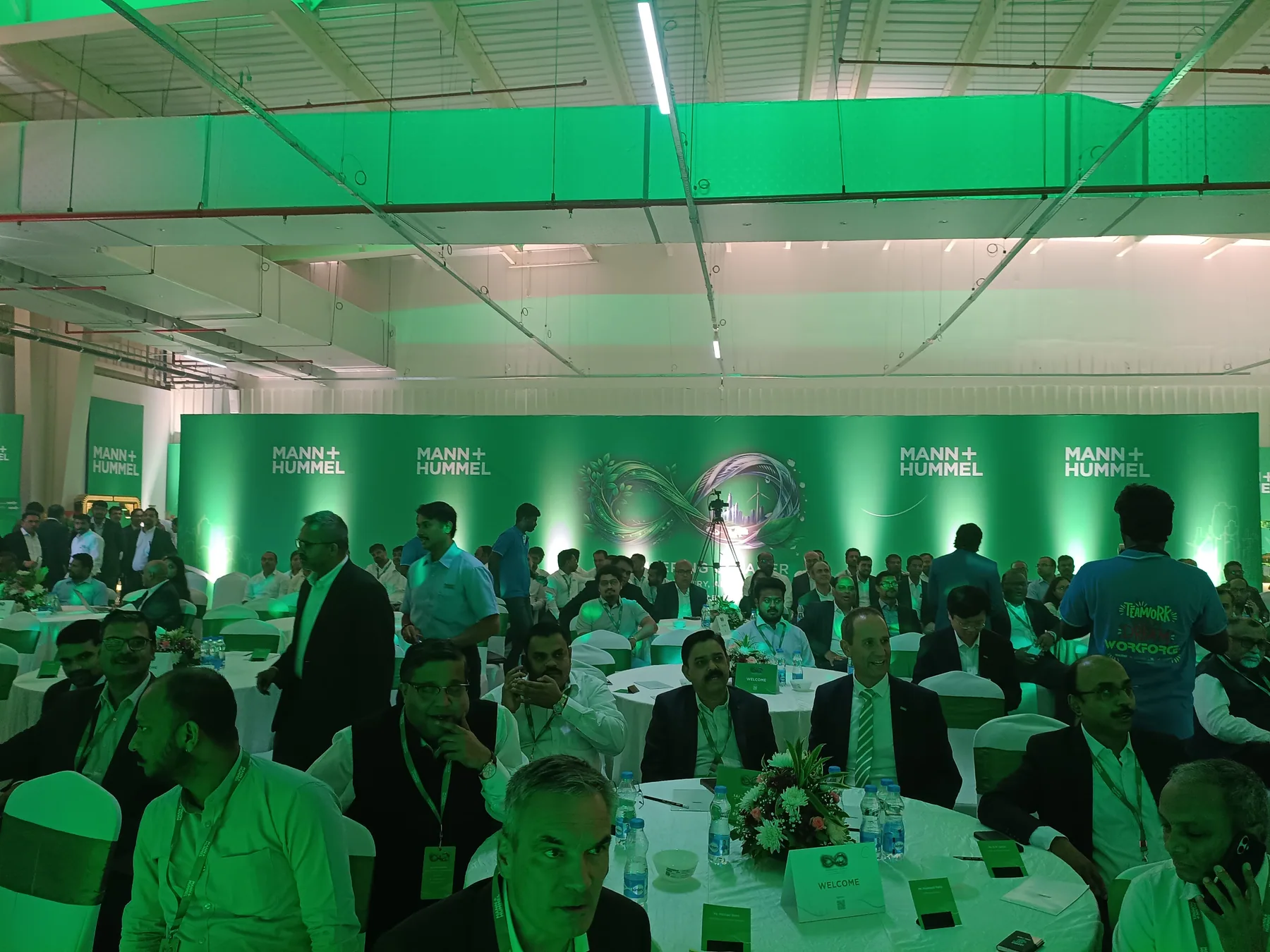 Guests seated at round tables