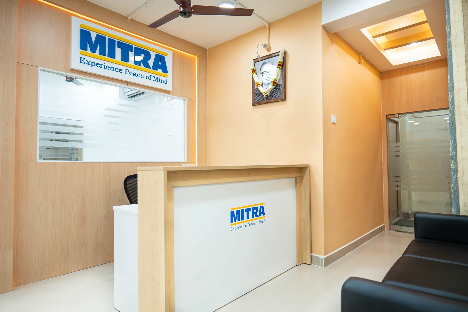 Reception counter, visitor seating and timber wall finish