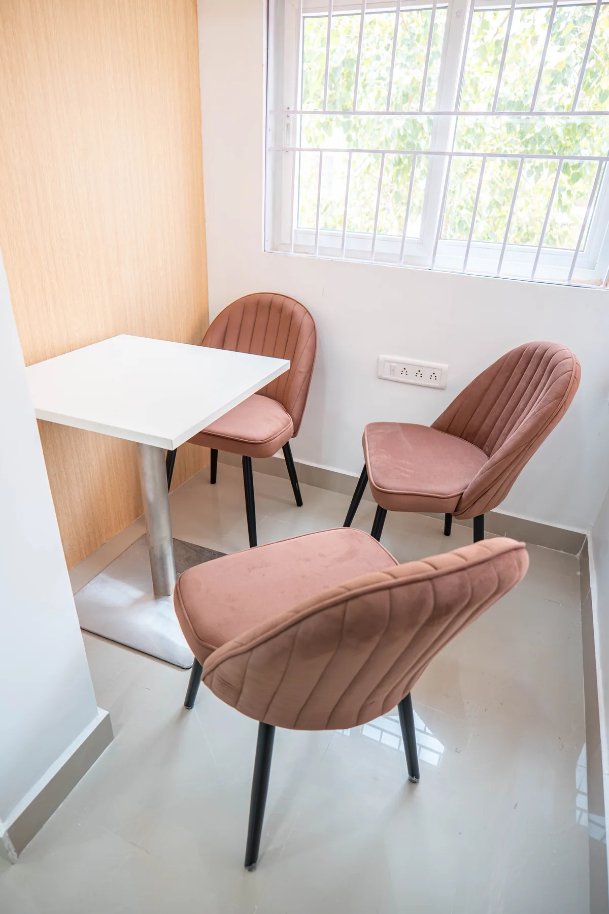 Small meeting area beside a window