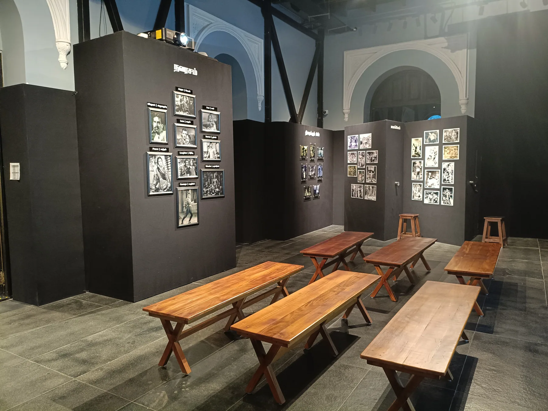 Photographic displays beside the projection seating