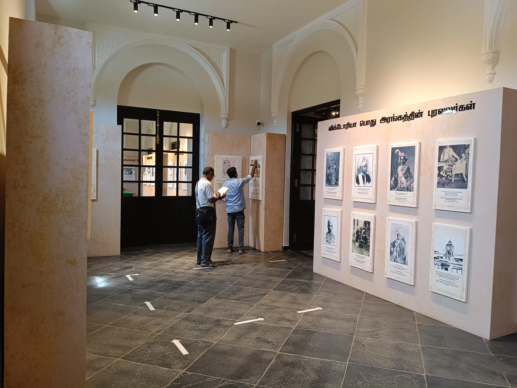 Visitors beside the gallery interpretation panels