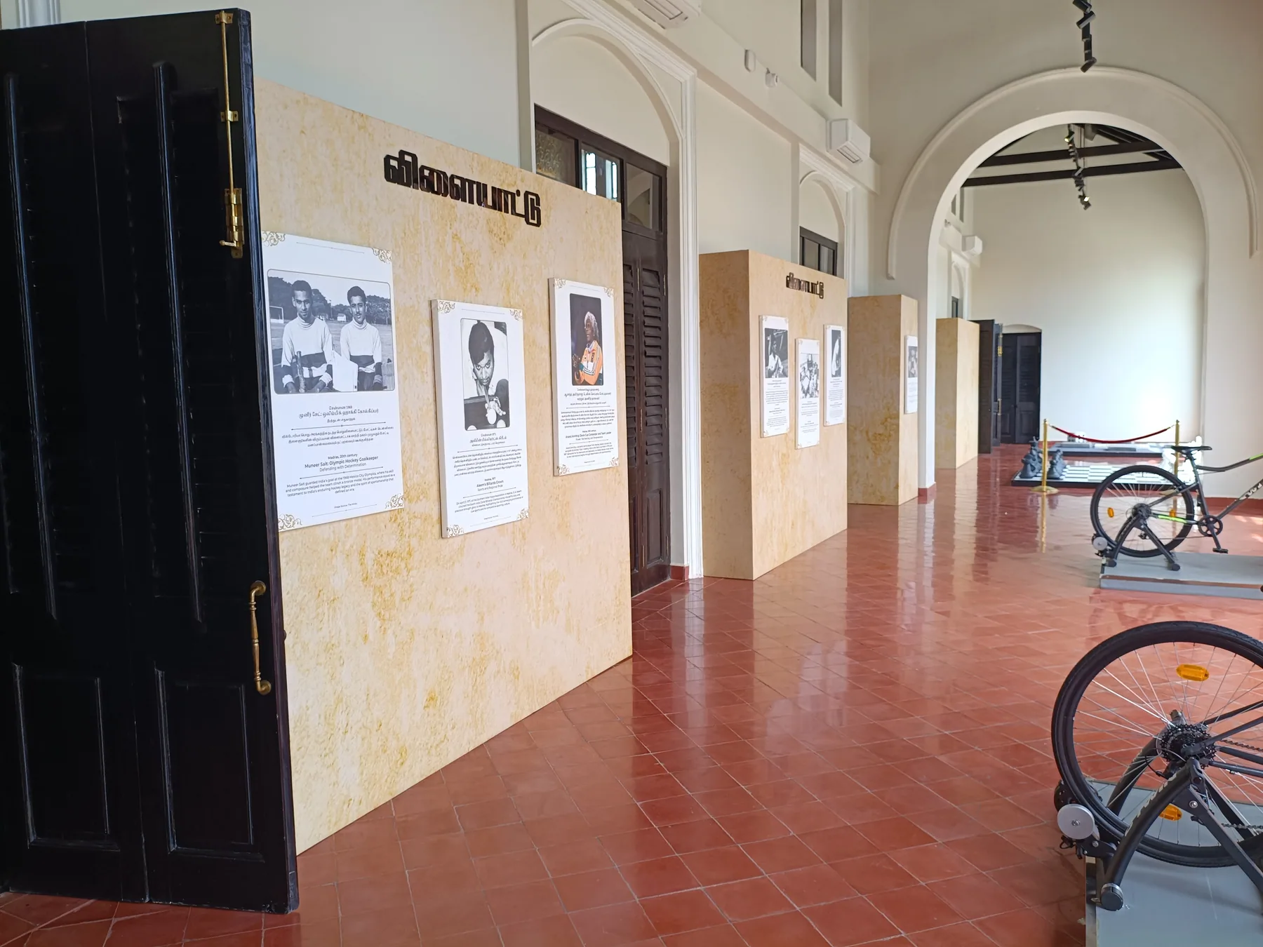 Interpretation panels beside a bicycle exhibit