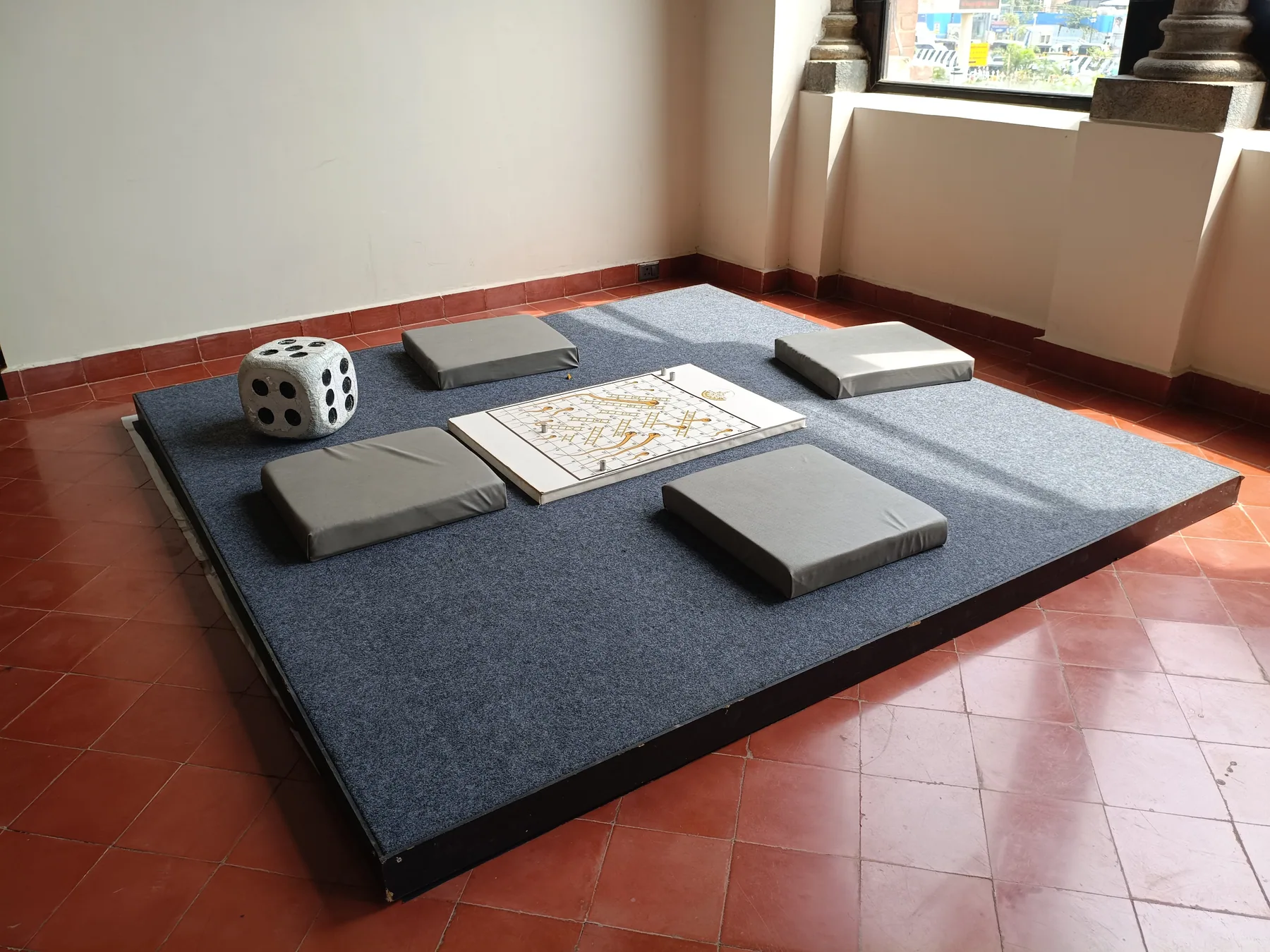 Board games displayed on a low table