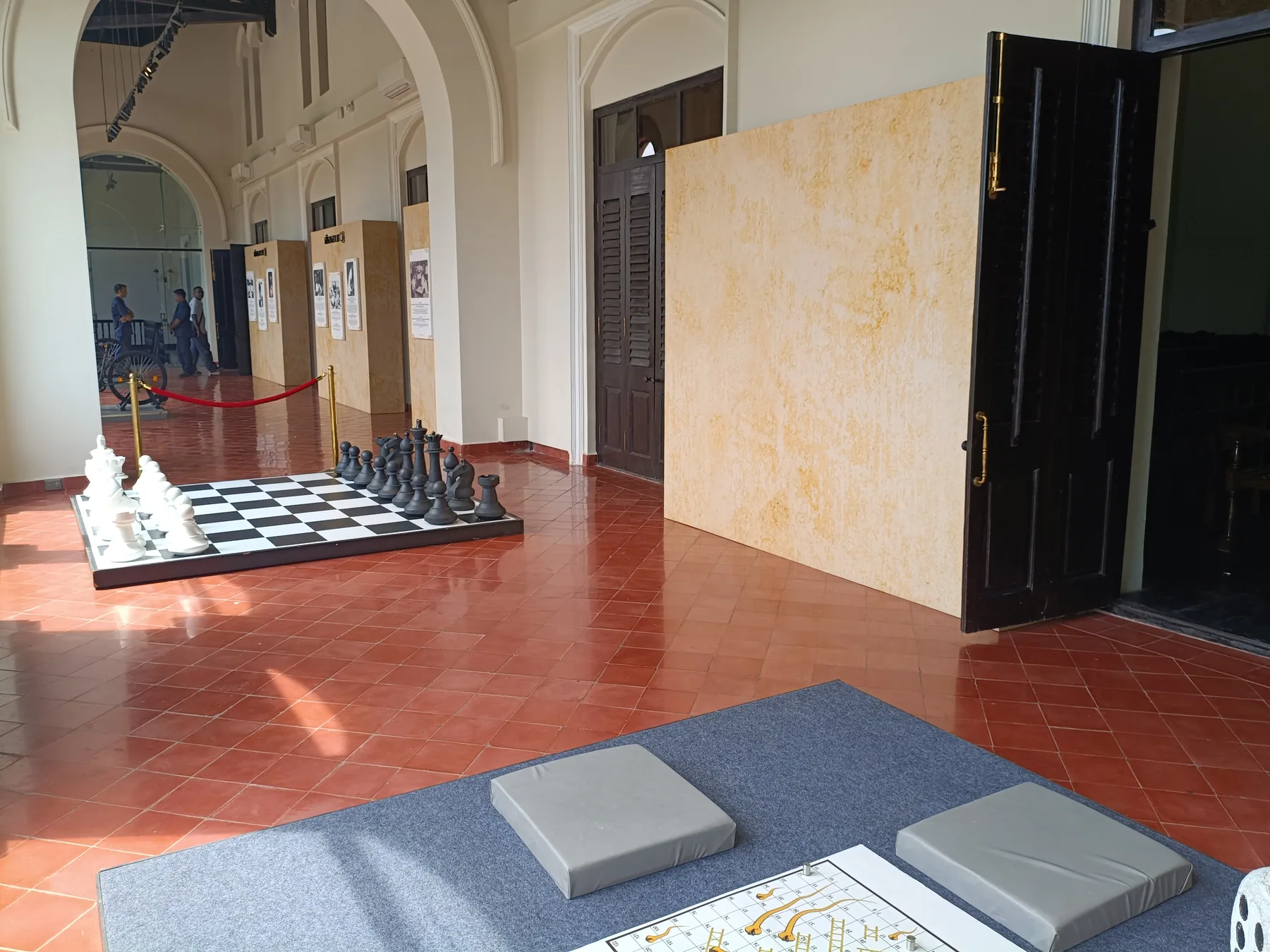 Game exhibits beside freestanding interpretation walls